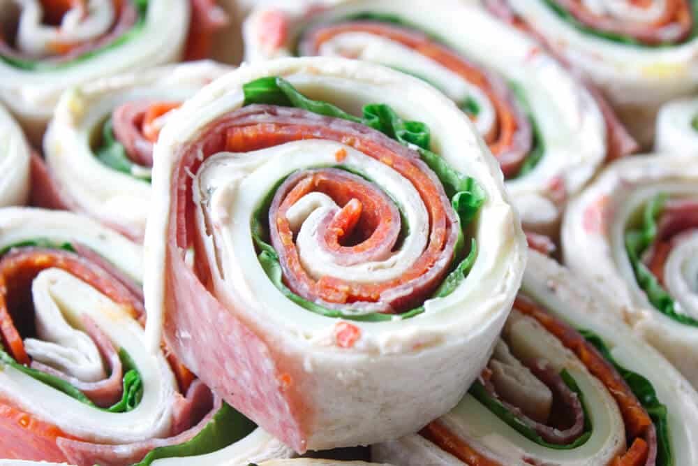 Are you looking for creative roll ups for a lunchbox, potluck party or as an appetizer? Check out these 20 pinwheel recipes from fellow food bloggers!