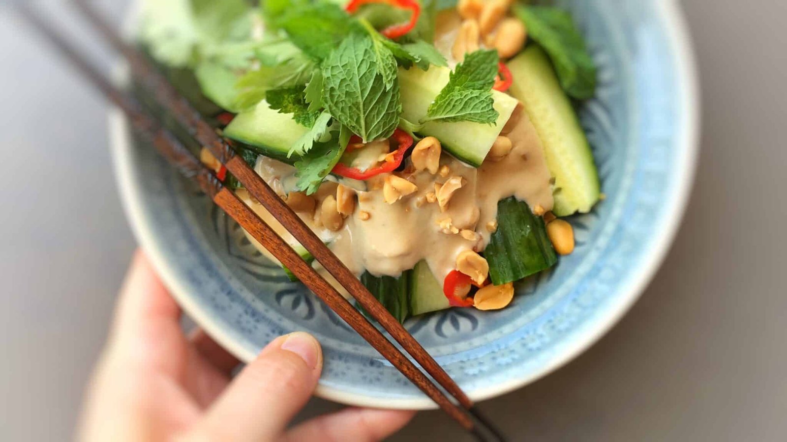 Here's a great vegetable summer side dish: my Thai stir fried cucumber covered in a creamy homemade peanut sauce... Delicious!