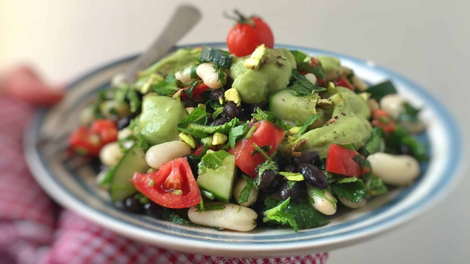 A bunch of beans and vegetables topped with a layer of this gorgeous creamy avocado dressing... What a great lunch idea!!