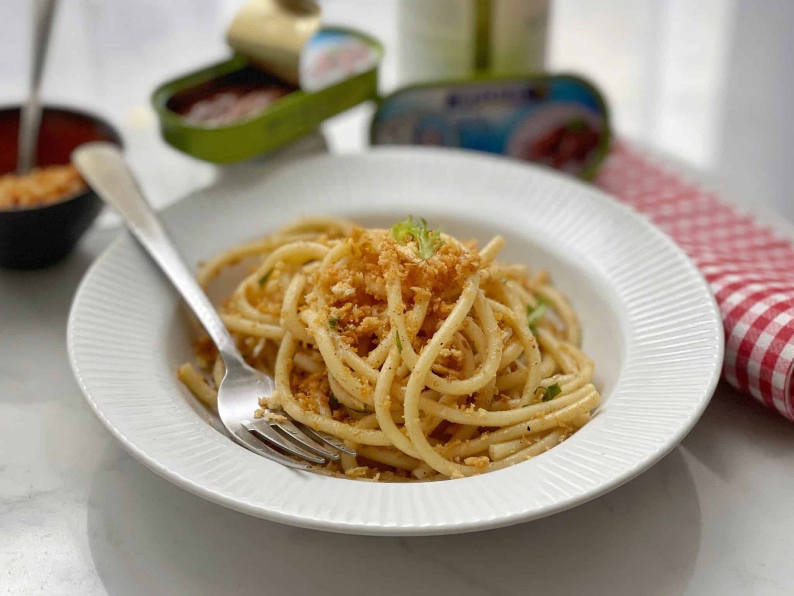 A delicious Sicilian anchovy spaghetti recipe, a surprisingly simple spaghetti recipe with salted anchovies and breadcrumbs.