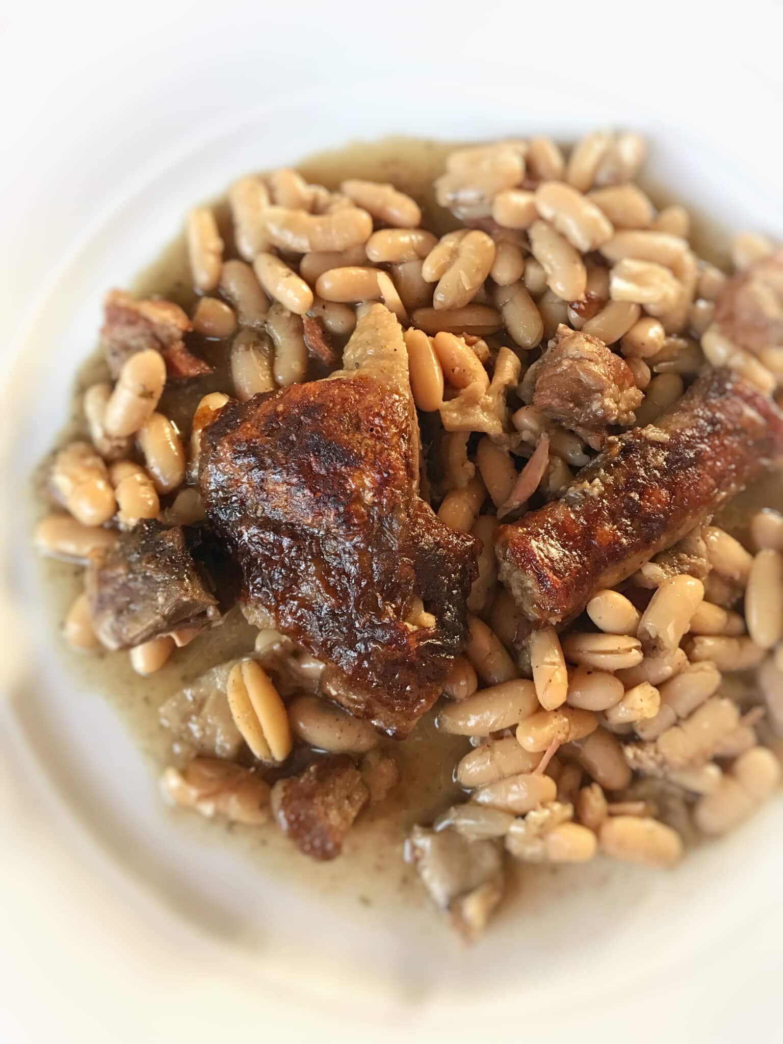 Another French classic I love: my cassoulet recipe! A simple white bean and bacon stew with confit duck... top notch French winter comfort food!