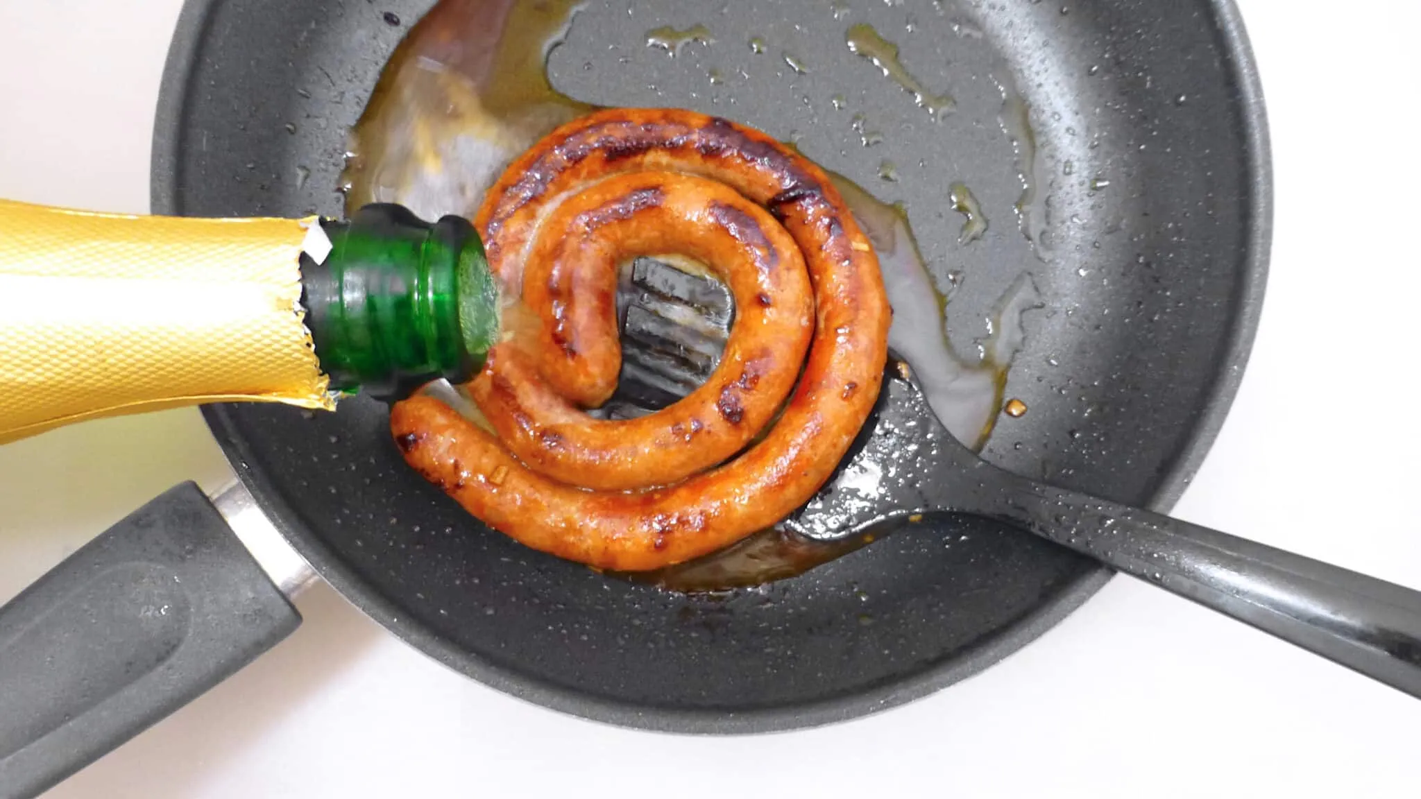 Chorizo a la sidra or chorizo sausage in apple cider, a Spanish classic! And a new addition to my Spanish tapas dinner with friends!