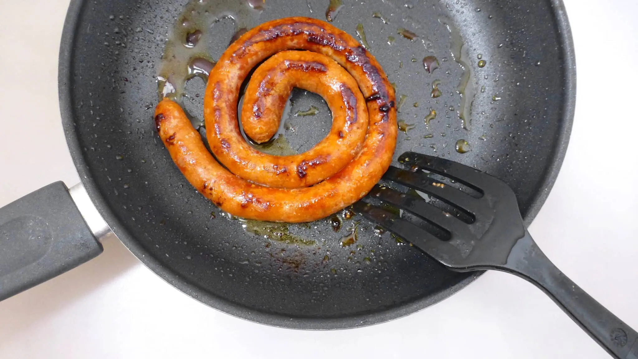 Chorizo a la sidra or chorizo sausage in apple cider, a Spanish classic! And a new addition to my Spanish tapas dinner with friends!