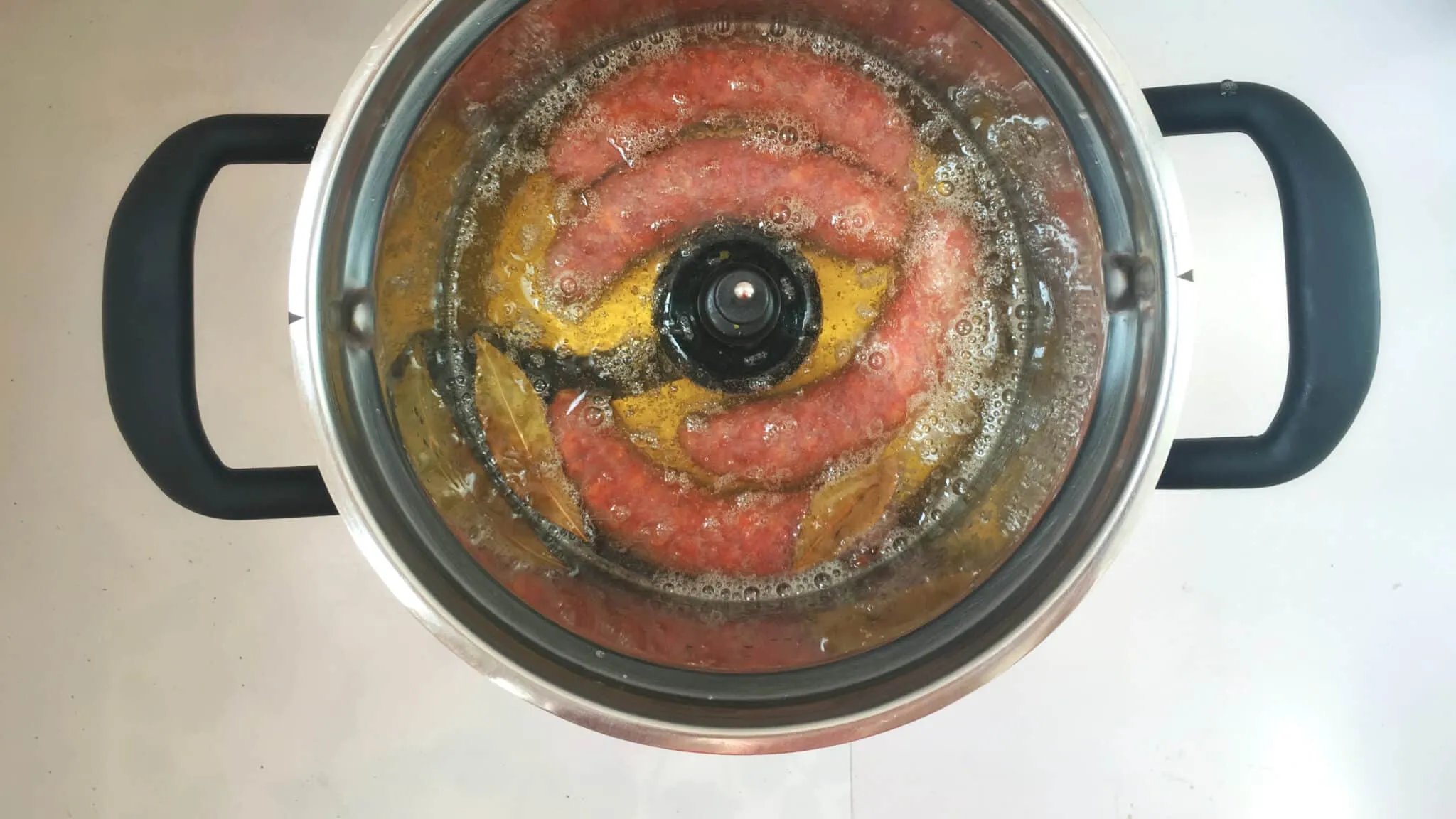 Chorizo a la sidra or chorizo sausage in apple cider, a Spanish classic! And a new addition to my Spanish tapas dinner with friends!