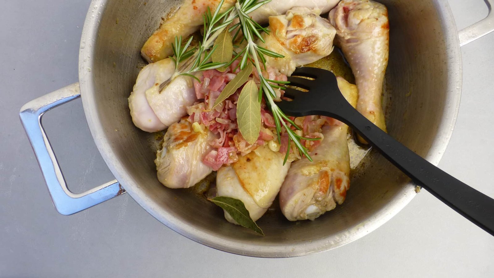 Classic coq au vin recipe, a French chicken in red wine stew with mushrooms! And a great make ahead dinner... Serve with mashed potatoes or fries!