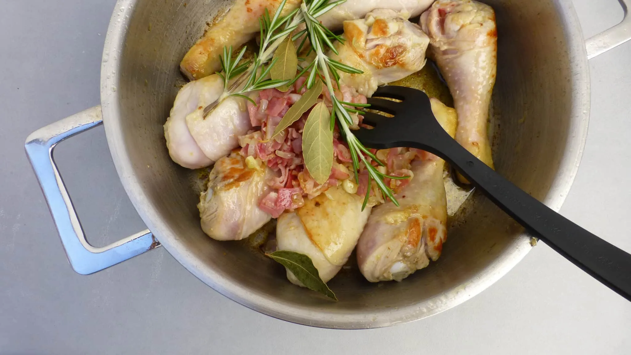 Classic coq au vin recipe, a French chicken in red wine stew with mushrooms! And a great make ahead dinner... Serve with mashed potatoes or fries!
