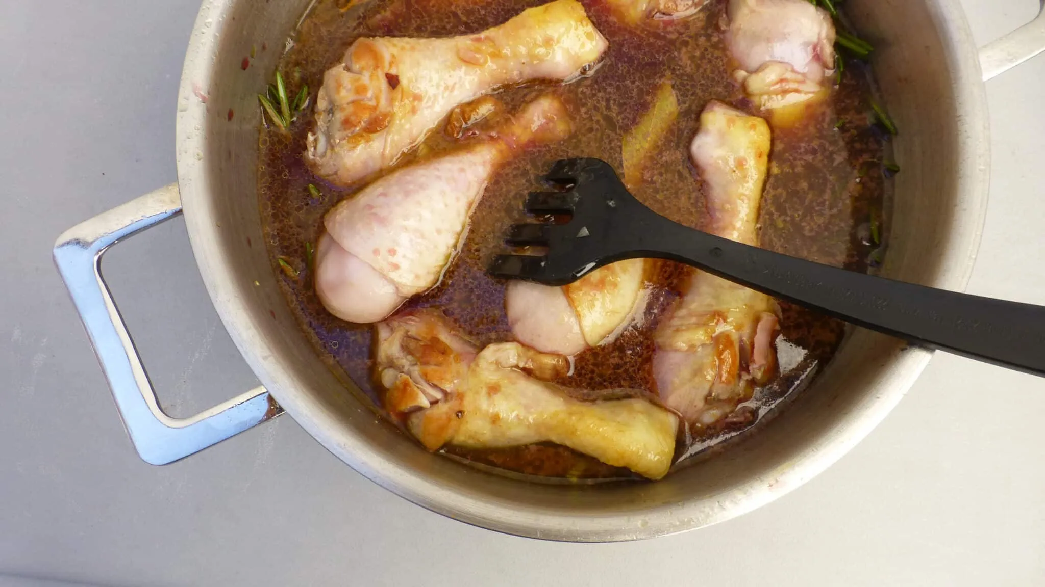 Classic coq au vin recipe, a French chicken in red wine stew with mushrooms! And a great make ahead dinner... Serve with mashed potatoes or fries!