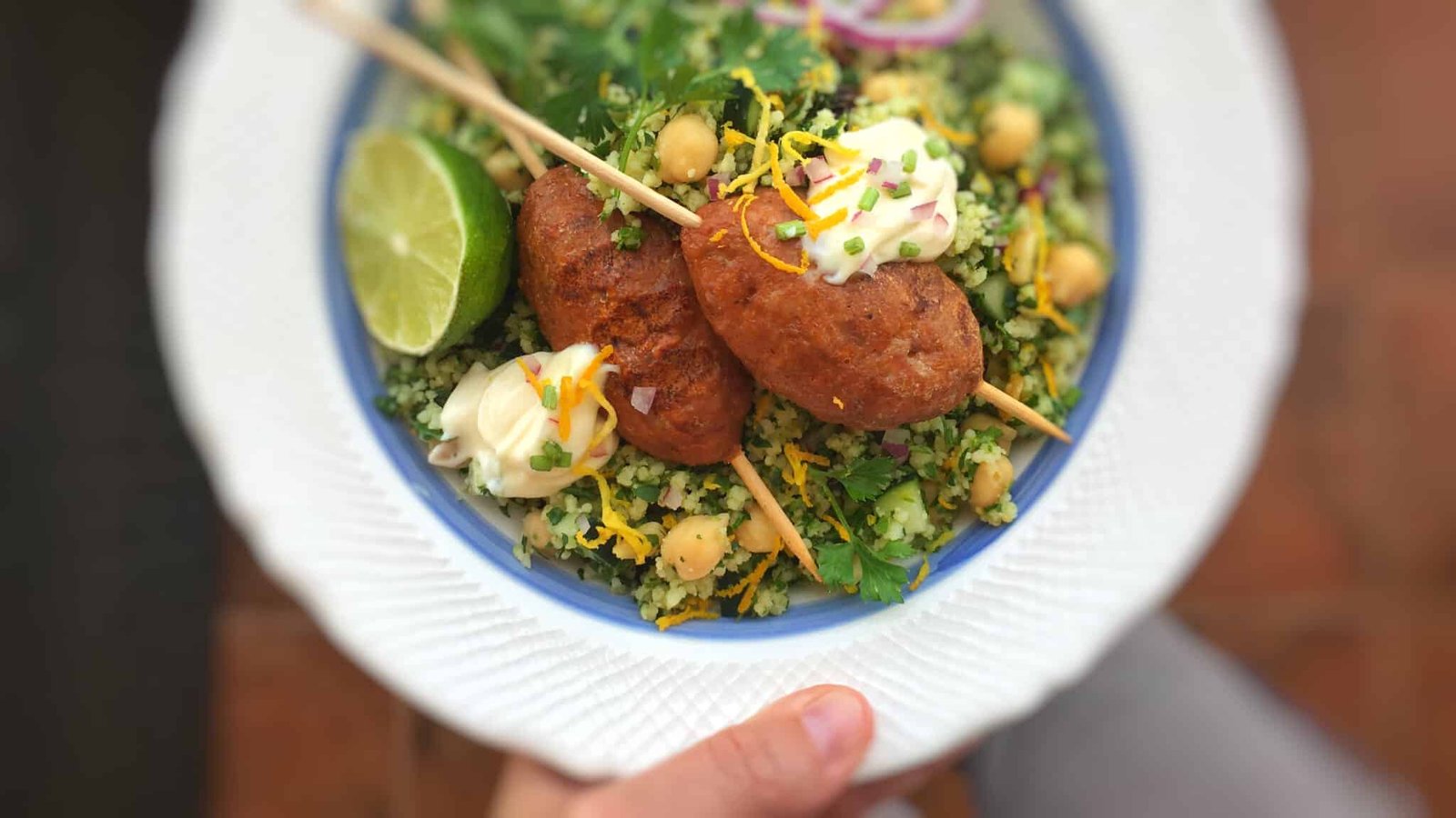 Look at these savory lamb kofta kebabs... Packed with beautiful Middle Eastern spices and served with a flavorful orange zest couscous!