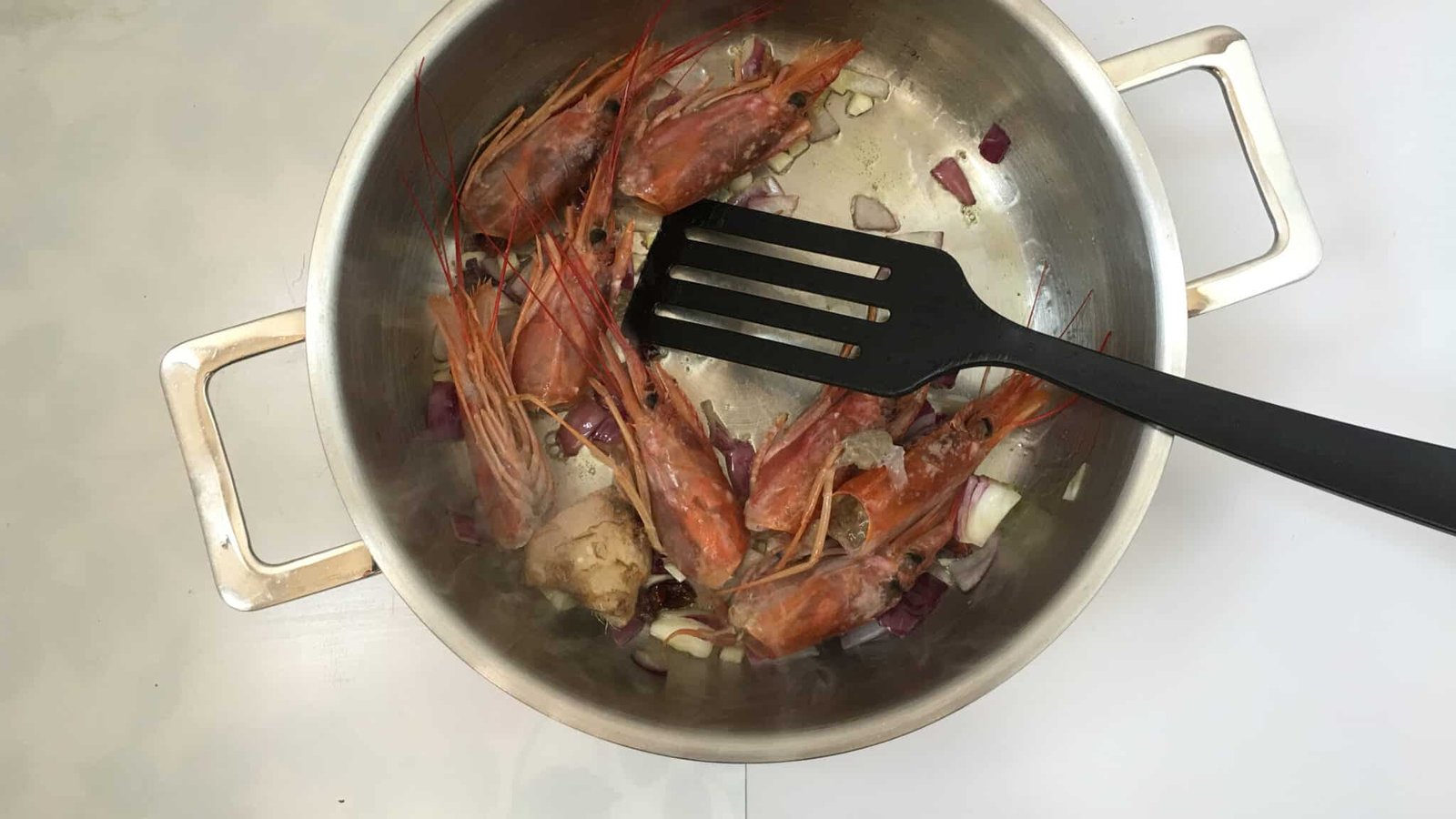 Do you throw away fresh prawn heads? See what a gorgeous creamy rustic prawn head soup you can make with it!