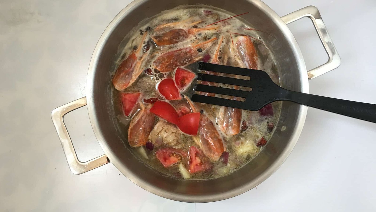 Do you throw away fresh prawn heads? See what a gorgeous creamy rustic prawn head soup you can make with it!