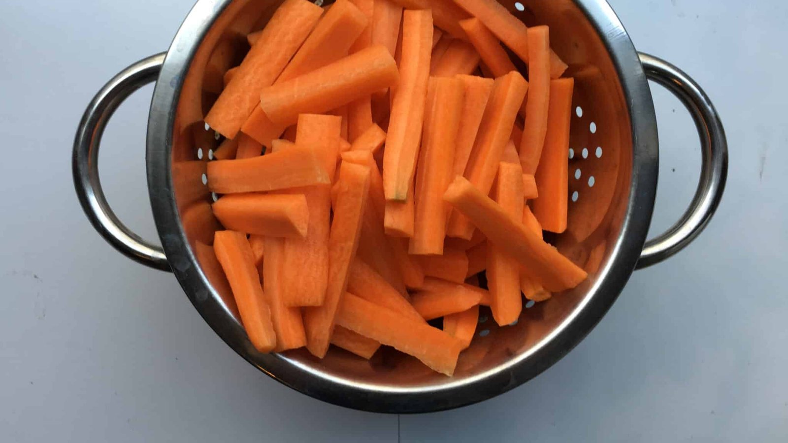 Spiced pan roasted carrots coated with a melted homemade lemon and cilantro butter... A great side dish for juicy pork chops!