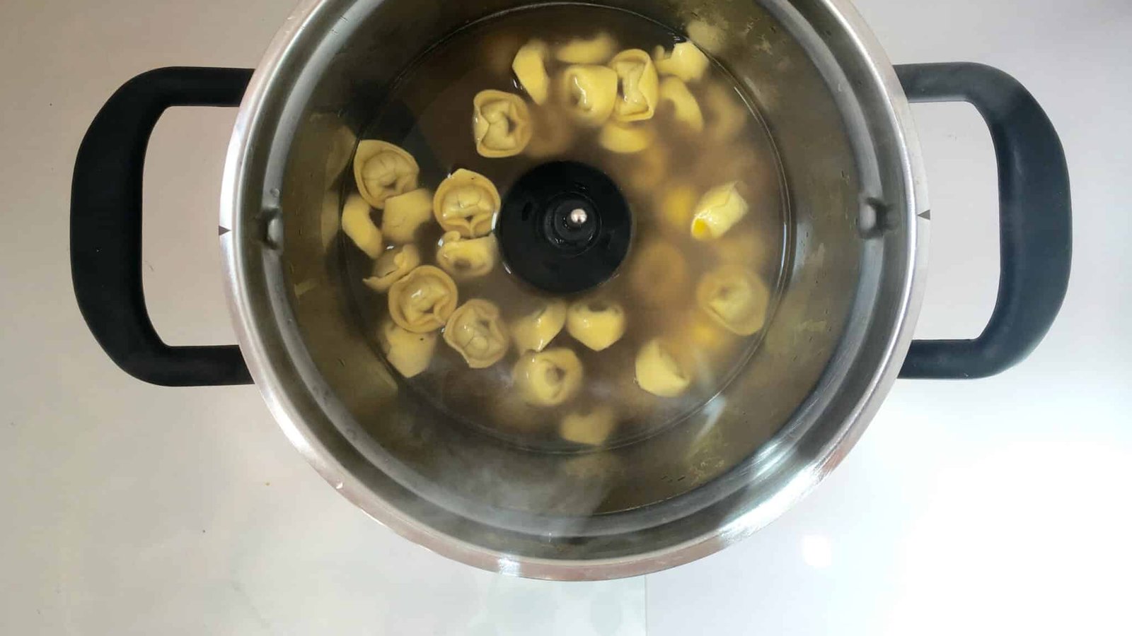 Tortellini in brodo: silky stuffed pasta in a hot broth! What a great Italian pasta soup this is, the perfect light lunch!