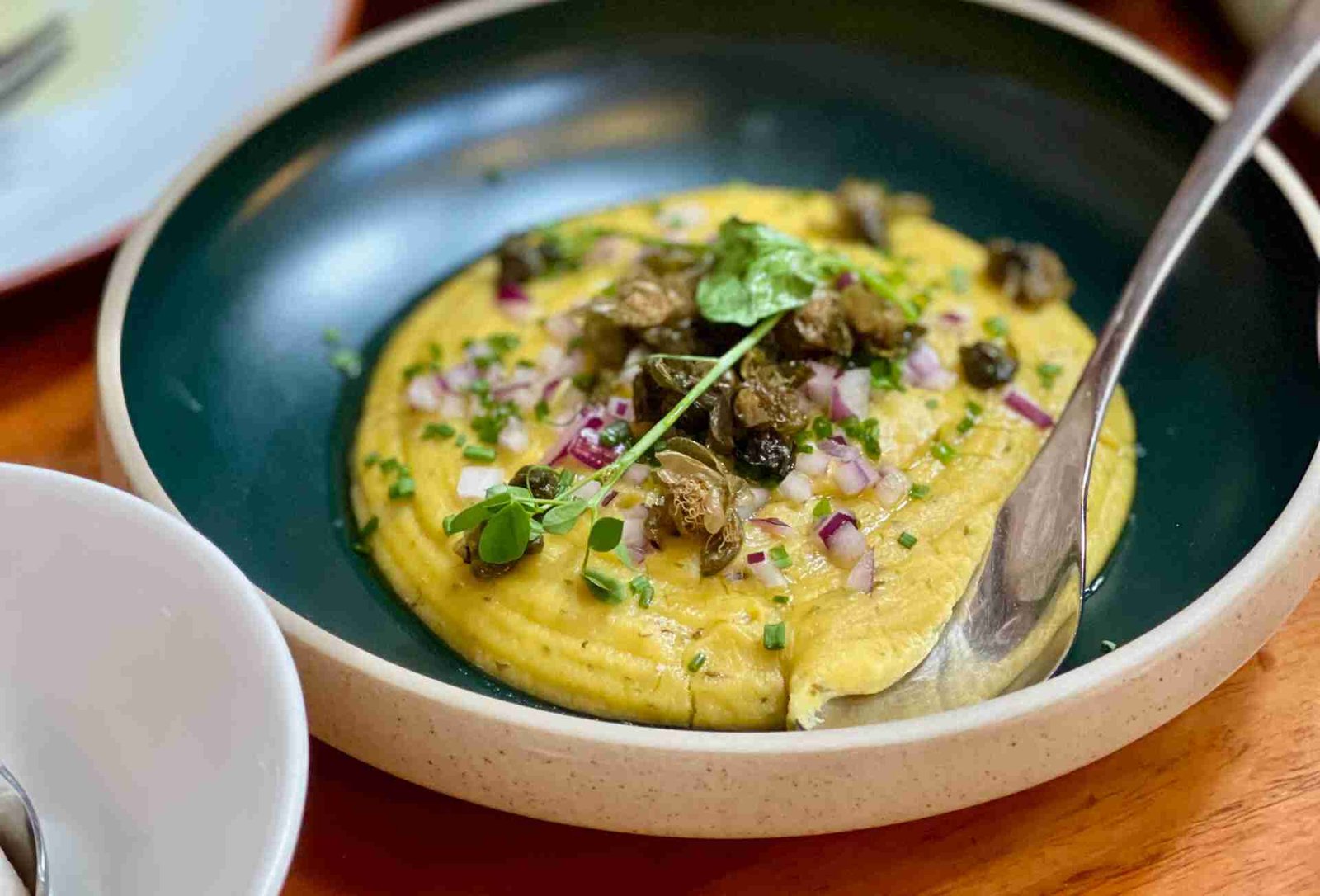 Here's a famous Greek fava bean recipe: a yellow pea dip from Santorini... Served lukewarm and topped with olive oil and chopped onion!
