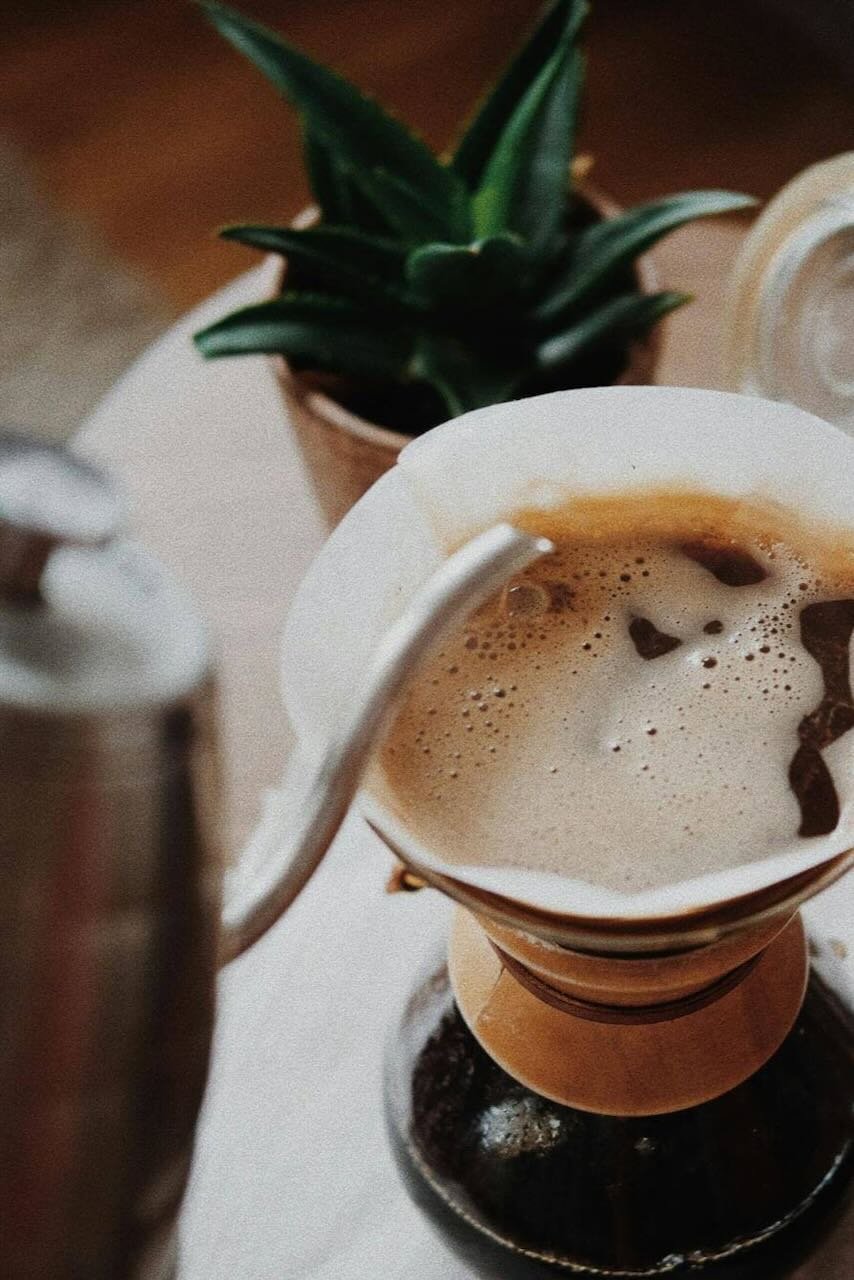 My Recipes Pour-over coffee brewing with beans nearby.